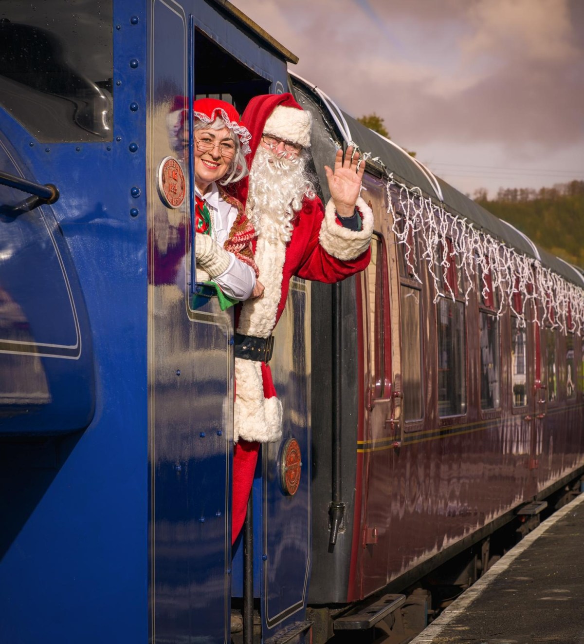 Santa Special Image 1 a group of people riding on the back of a train