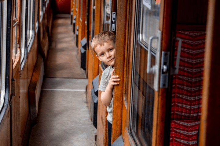 a little boy looking at the camera