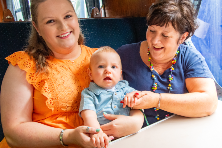 a person holding a baby
