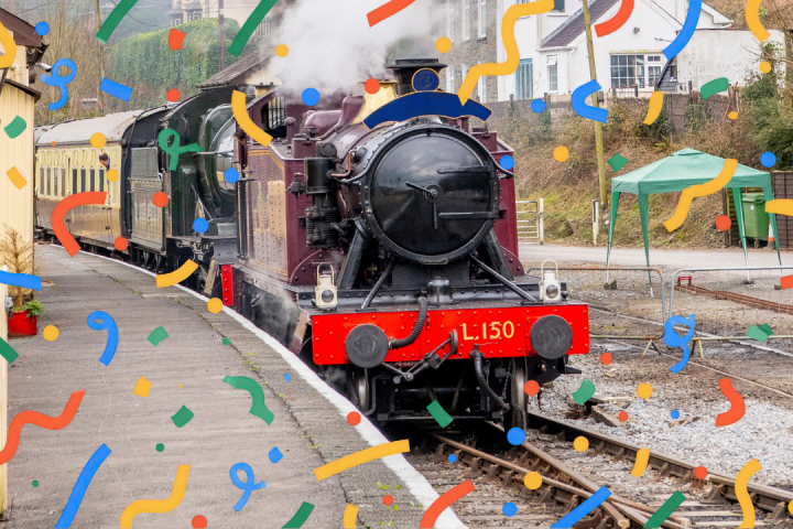 Vintage steam train on the tracks surrounded by colorful confetti graphics.